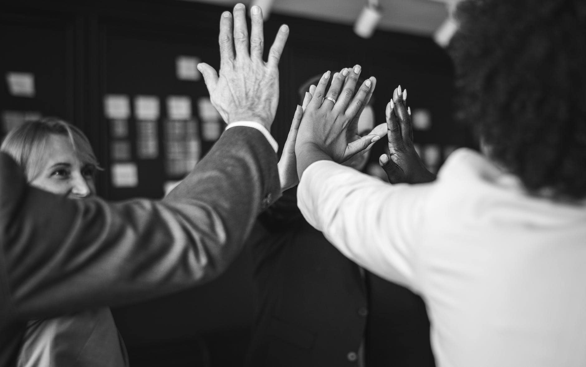 Team High-Five at Work Social Event high fives