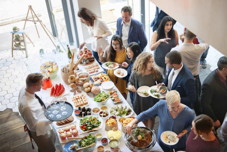 corporate-event-catering-salt-lake-valley-900×604 people mingling and eating