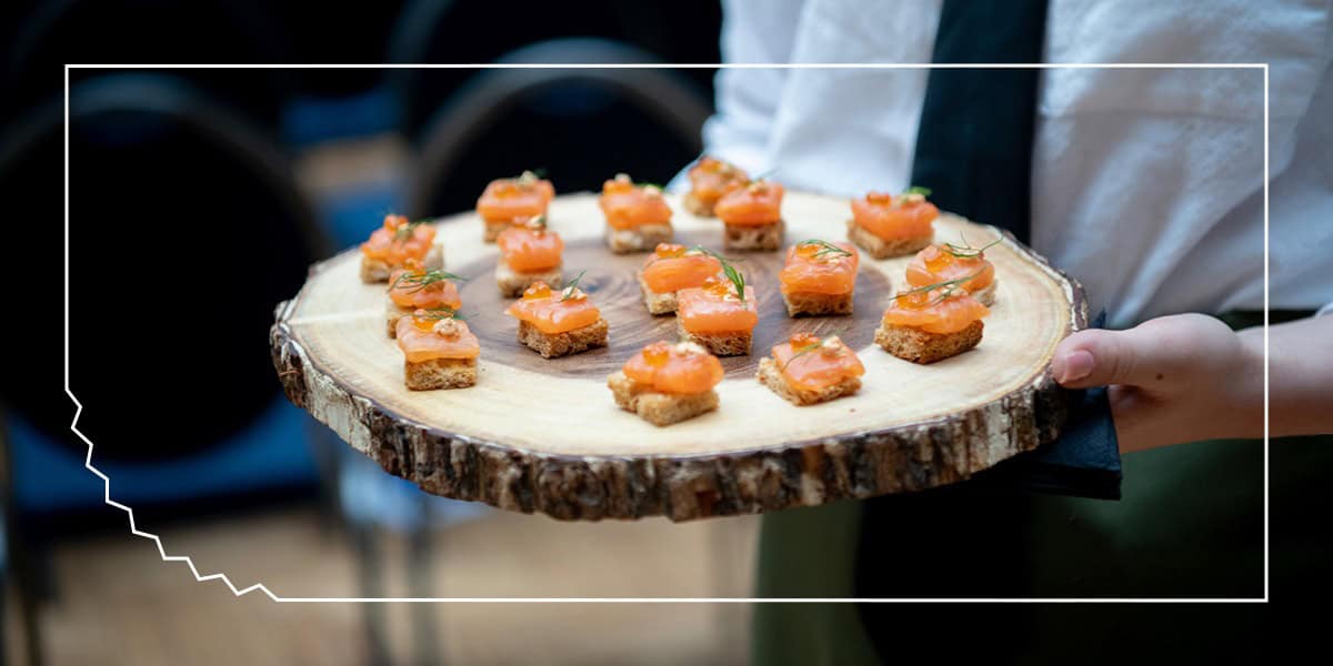 Gourmet Appetizers at Catering Event waiter holding tray of appetizers